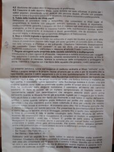 Retro del volantino distribuito a Sassari
