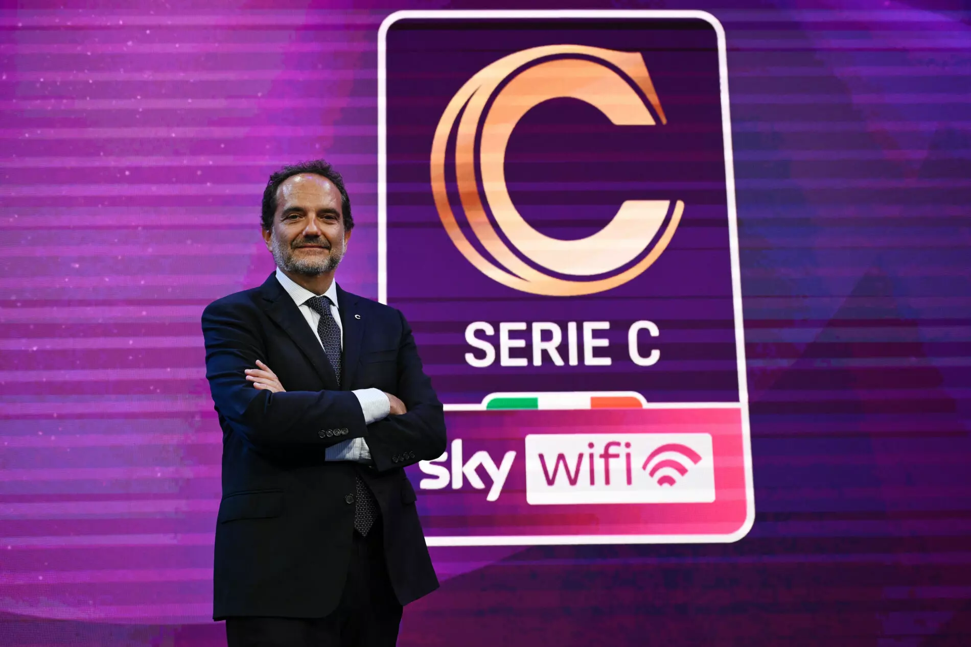 Il presidente della Lega Pro Matteo Marani e il logo della Serie C